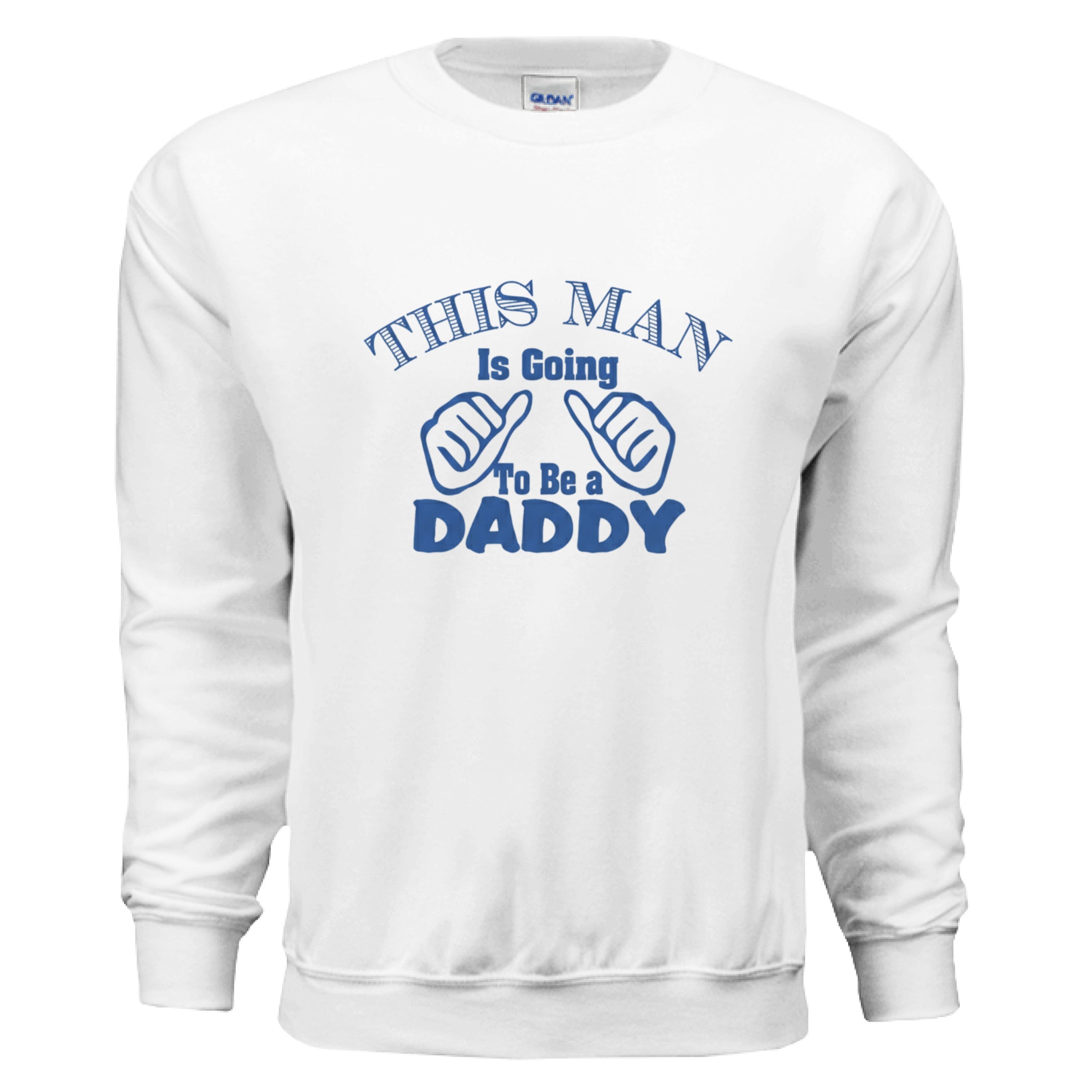 Daddy Long Sleeve Gildan 8 oz fleece crewneck sweatshirt with "This Man Is Going To Be A Daddy" text in blue on white.